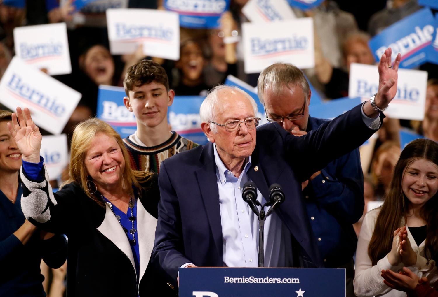 Democratic U.S. presidential candidate Senator Bernie Sanders is accompanied by his relatives, including his wife Jane, as he addresses supporters at his Super Tuesday night rally in Essex Junction, Vermont, U.S., March 3, 2020. REUTERS/Caitlin Ochs