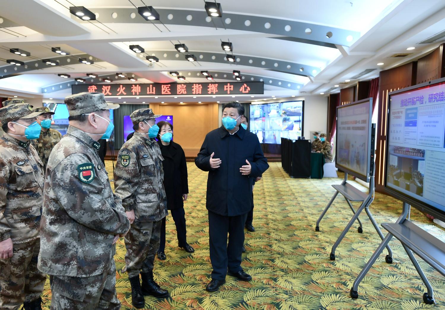 Chinese President Xi Jinping learns about the hospital's operations, treatment of patients, protection for medical workers and scientific research at the Huoshenshan Hospital in Wuhan, the epicentre of the novel coronavirus outbreak, Hubei province, China March 10, 2020. Xie Huanchi/Xinhua via REUTERS   ATTENTION EDITORS - THIS IMAGE WAS PROVIDED BY A THIRD PARTY. CHINA OUT. NO RESALES. NO ARCHIVES.     TPX IMAGES OF THE DAY