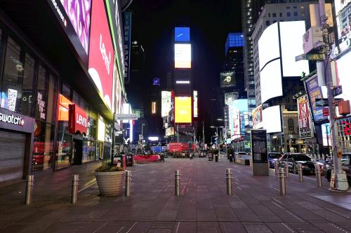 Few people are seen at Times Square in Manhattan, New York in the night March 22, 2020. New York. Gov. Andrew Cuomo has ordered New Yorkers to stay home to slow the new coronavirus pandemic from 22th night. ( The Yomiuri Shimbun )