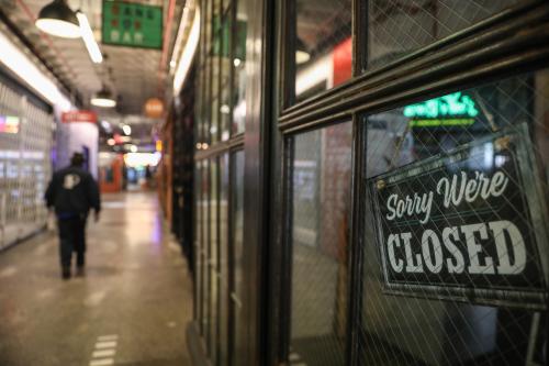 A worker cleans an empty hall in Industry City, where are the shops have been closed due to the outbreak of the coronavirus disease (COVID-19) the Brooklyn borough of New York City, U.S., March 26, 2020. REUTERS/Stephen Yang