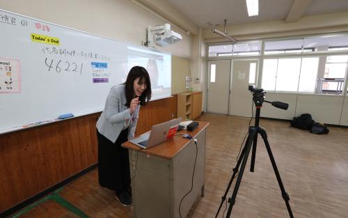 A teacher conducts a remote class through a tablet computer at a junior high school attached to Wakayama University Education Faculty in Wakayama  Prefecture  on March 3rd, 2020, amid an outbreak of the new coronavirus COVID-19 in Japan. The Japanese government requested all elementary, junior high, high schools in the country to close from Monday until the start regular spring break as a part of measures to reduce the risk of infection. However, some schools held several its events.  The number of the new coronavirus COVID-19-hit patients has reached to 980 and the death toll has been confirmed 12 far as of March 1st in Japan. ( The Yomiuri Shimbun )