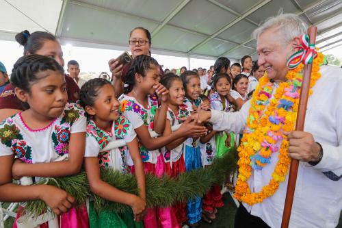 Mexico's President Andres Manuel Lopez Obrador shakes hands with girlds while visiting towns in the southwestern state of Guerrero, as Mexico's health ministry urged people to mantain a "healthy distance" to avoid infection and the spreading of coronavirus (COVID-19), in Ayutla de los LIbres, Mexico March 15, 2020. Mexico's Presidency/Handout via REUTERS ATTENTION EDITORS - THIS IMAGE HAS BEEN SUPPLIED BY A THIRD PARTY. NO RESALES. NO ARCHIVES