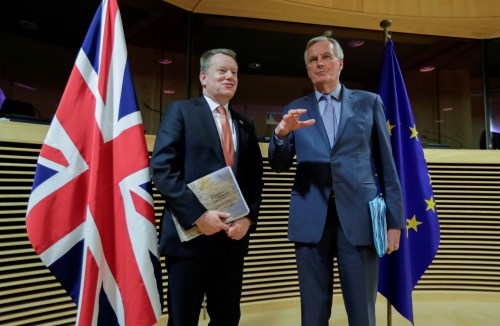 FILE PHOTO: European Union chief Brexit negotiator Michel Barnier and British Prime Minister's Europe adviser David Frost 5 are seen at start of the first round of post -Brexit trade deal talks between the EU and the United Kingdom, in Brussels, Belgium March 2, 2020. Oliver Hoslet/Pool via REUTERS/File Photo