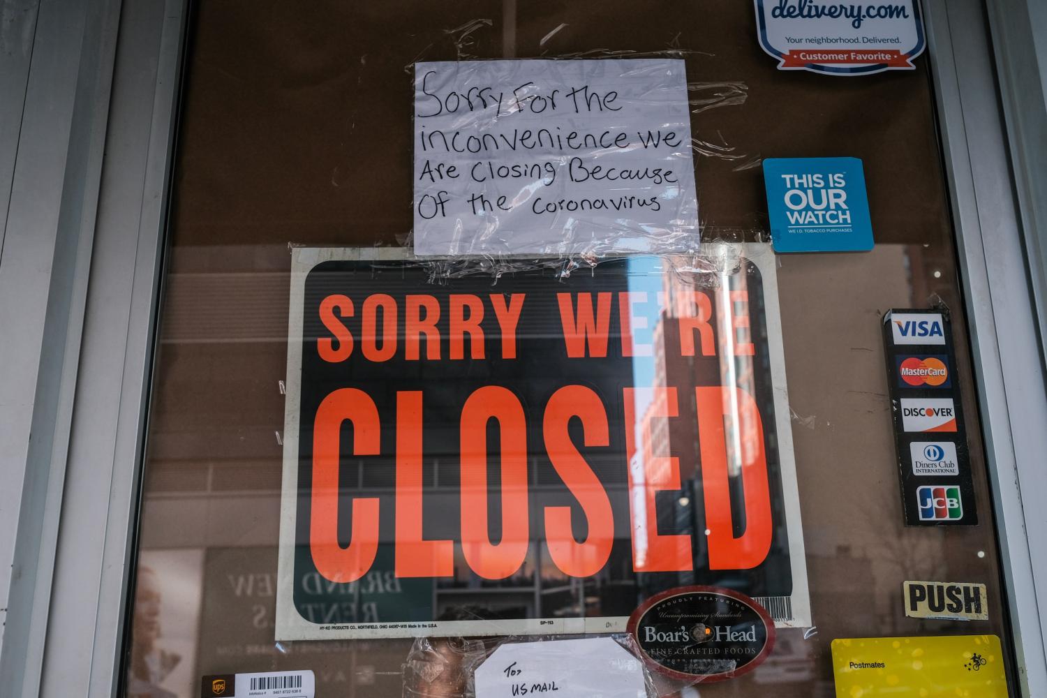 FILE PHOTO: A deli is seen closed, due to the outbreak of the coronavirus disease (COVID-19) in the Brooklyn borough of New York City, U.S., March 26, 2020. REUTERS/Stephen Yang/File Photo