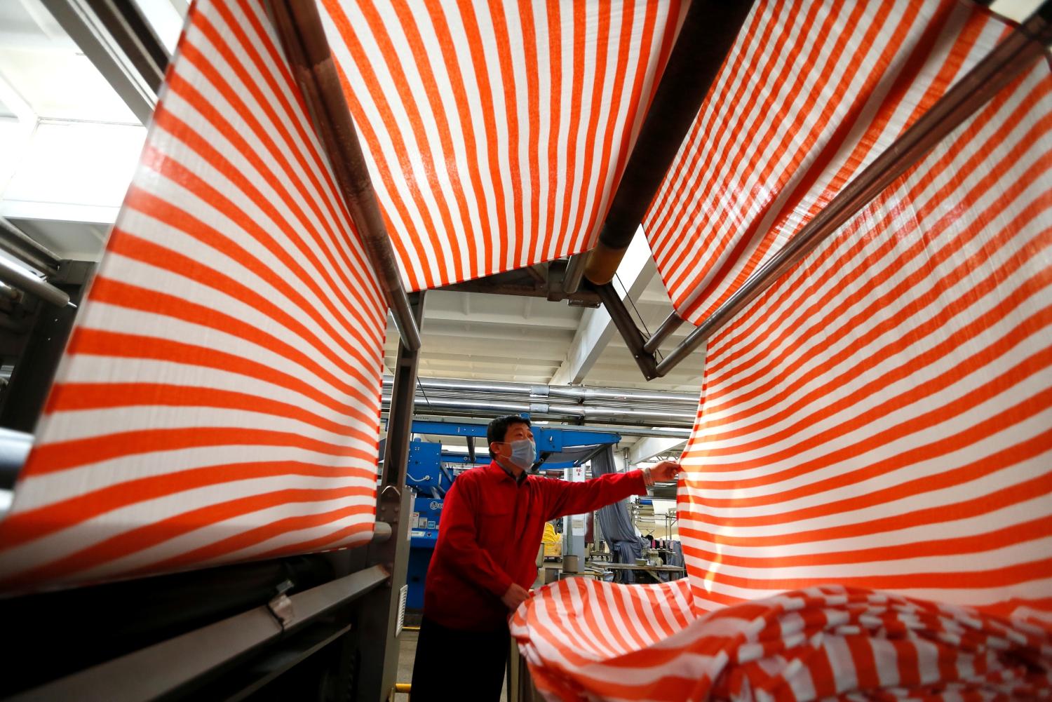 Staff at a local spinning mill work to produce n to meet the demand of overseas customers, Jimo district, Qingdao city, east China's Shandong province, 5 March 2020.   fachaoshiNo Use China. No Use France.