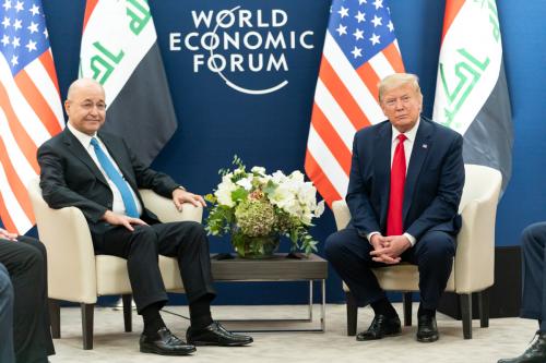 US President Donald Trump (R) and Iraqi President Barham Salih attend a bilateral meeting on the sidelines of the 50th World Economic Forum.