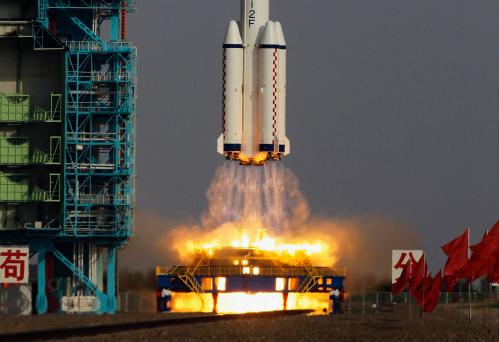 The Long March II-F rocket loaded with a Shenzhou-9 manned spacecraft carrying Chinese astronauts Jing Haipeng, Liu Wang and Liu Yang lifts off from the launch pad in the Jiuquan Satellite Launch Center, Gansu province June 16, 2012. China launched the spacecraft putting its first woman, 33-year-old female fighter pilot Liu Yang, in orbit on Saturday as the country takes its latest step towards building a space station within the decade. REUTERS/Jason Lee (CHINA - Tags: MILITARY SCIENCE TECHNOLOGY)