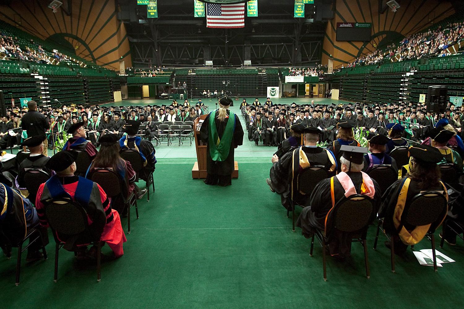 Professor Denise Apodaca, middle, gives the commencement address to graduates during the graduation ceremony for the College of Liberal Arts in Moby Arena at Colorado State University in Fort Collins, Colo. on Saturday, Dec. 21, 2019.Csu Liberalartsgraduation3