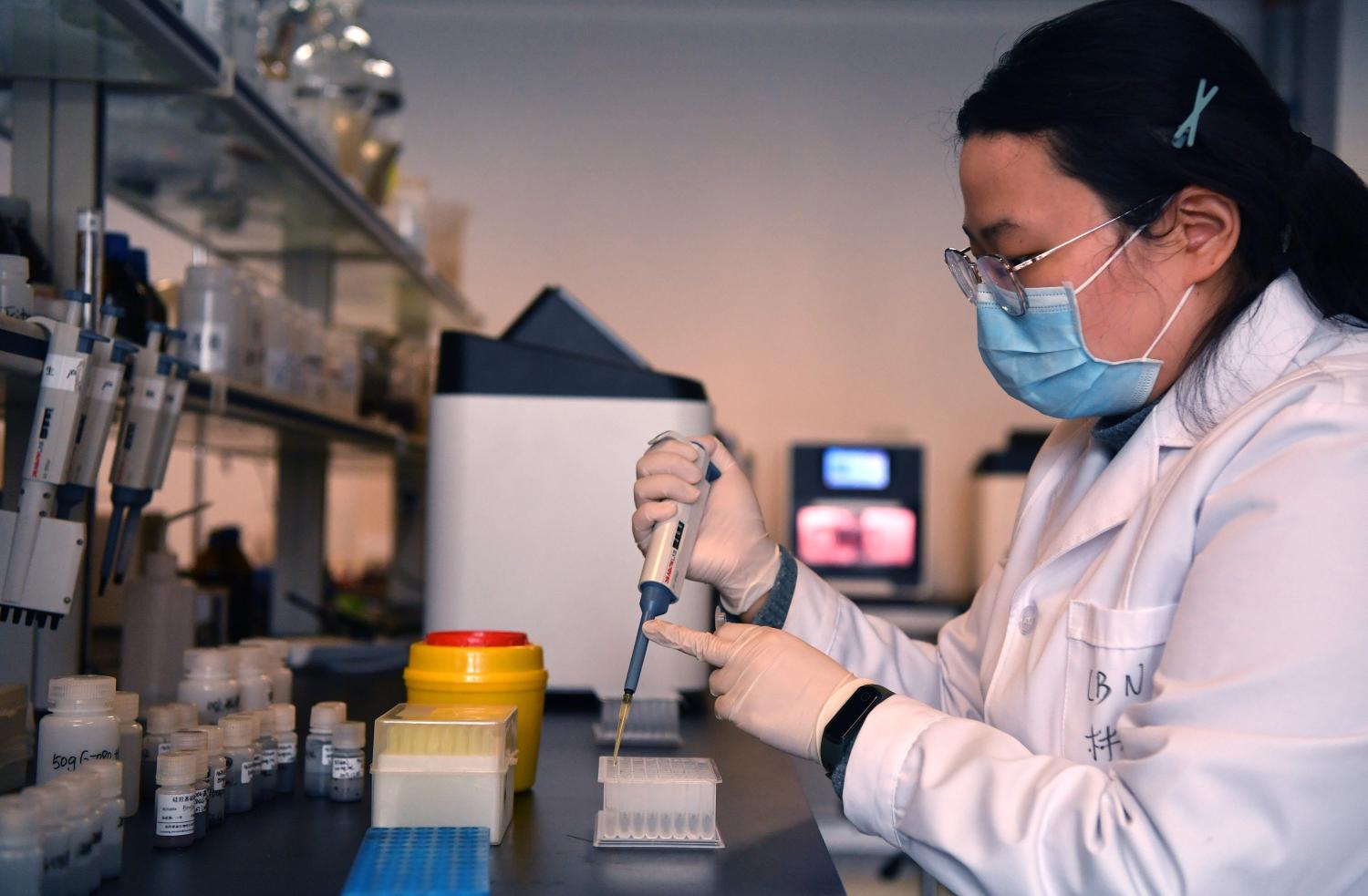 LUOYANG, CHINA- In the photos, staff works to produce the nucleic acid test kit at the Luoyang Ascend Biotechnology Co., Ltd plant in Luoyang, Henan Province in central China, March 4, 2020. To help combat The epidemic of the new coronavirus, the company is in full capacity producing nucleic acid test kits, after the increase of imported coronavirus cases in the country.