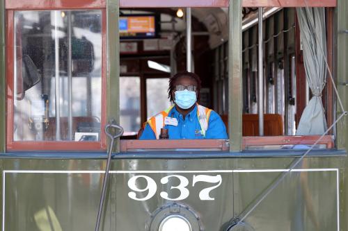 A streetcar driver wears a mask amid the outbreak of the coronavirus disease (COVID-19), in New Orleans, Louisiana, U.S. March 25, 2020. REUTERS/Jonathan Bachman