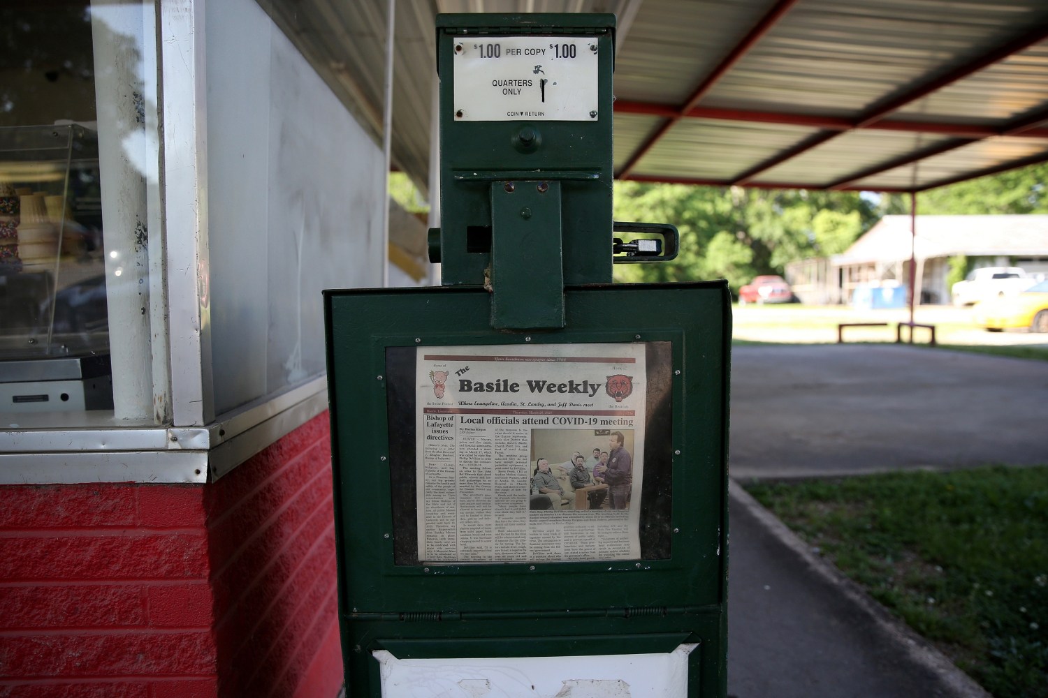 A newspaper vending machine is pictured in Basile amid a coronavirus disease (COVID-19) outbreak across the state of Louisiana, U.S., March 26, 2020.  REUTERS/Jonathan Bachman