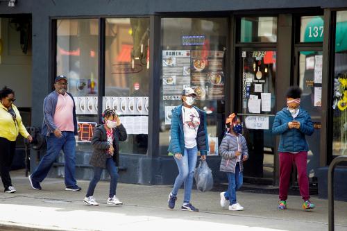 People walk along 53rd Street during the global outbreak of coronavirus disease (COVID-19) in Chicago, Illinois, U.S. April 7, 2020. REUTERS/Joshua Lott