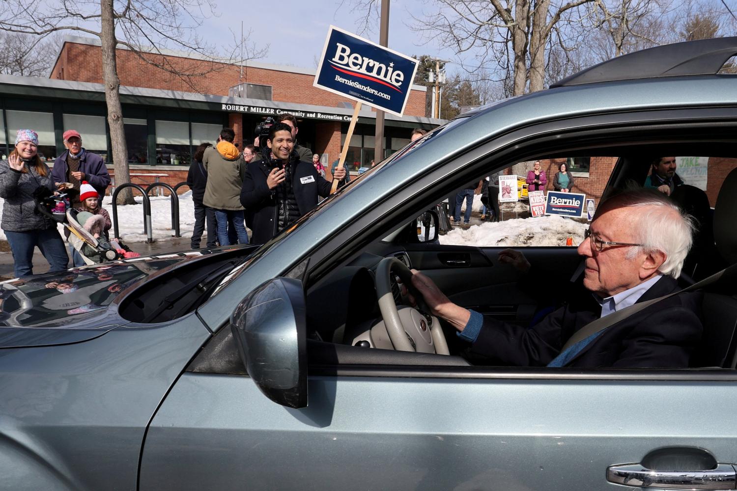 FILE PHOTO: Democratic 2020 U.S. presidential candidate Senator Bernie Sanders departs after he and his wife Jane O'Meara Sanders voted in the Vermont primary at their polling place in Burlington, Vermont, U.S. March 3, 2020. REUTERS/Jonathan Ernst/File Photo
