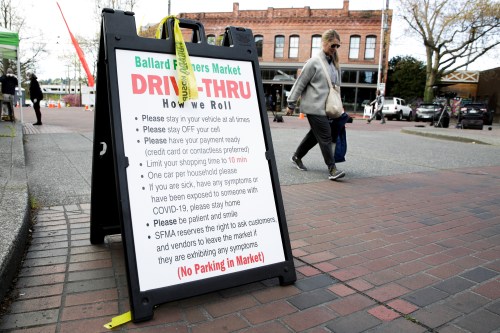 Rules for a new drive-thru option, where customers can shop from their cars, is pictured at the Ballard Farmers' Market which reopened Sunday with new safety measures as efforts continue to help slow the spread of the coronavirus disease (COVID-19) in Seattle, Washington, U.S. April 19, 2020.  REUTERS/Jason Redmond