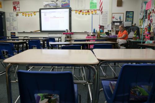 Petra Burns, a Fairview Middle School 6th grade math teacher, prepares for online instruction from her desk in her empty classroom on "the second first day of school" Monday, March 30, 3030.Second First Day Of School 033020 Ts 051