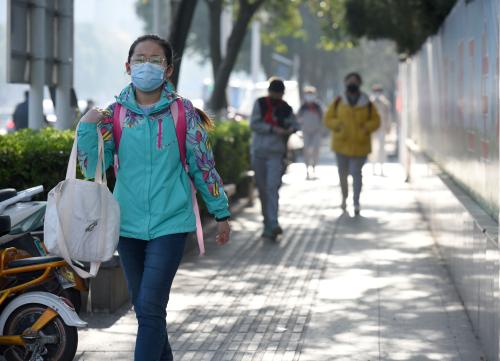 Students of a local primary school return to the campus after a two-and-half winter vacation, Huai'an city, east China's Jiangsu province, 7 April 2020.    fachaoshiNo Use China. No Use France.