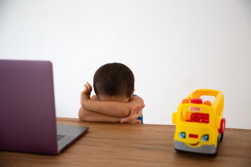 Thiago covering his face during a live class online on Zoom as he continues his homeschool during the fifth week of his school closure due to the coronavirus pandemic at a temporary home in Mérida, Yucatán, Mexico on April 15, 2020. Photographer Benedicte Desrus says, "With his school closed, my son is experiencing big changes to his routine. At such a young age, it's difficult for him to focus and sit behind a computer during a 40 minute long online class. He misses face-to-face teaching and his friends. Thiago, 3-years-old, is the son of the photographer. He was documented as part of a project titled When I grow up about a child growing up on quarantine, away from other children and from the outside world, during the coronavirus pandemic. (Photo by Bénédicte Desrus/Sipa USA)No Use UK. No Use Germany.