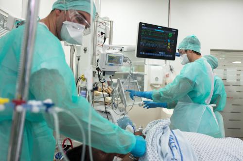 A team of doctors and nurses return a coronavirus patient to a room in the intensive care unit of Purpan Hospital. The hospital has been receiving patients with the coronavirus, COVID19, since the epidemic from China appeared in France and the country has been confined since 17 March 2020. A hundred or so carers take turns working permanently with contaminated hospital patients. 21 April 2020, Toulouse, France.Une equipe de medecins et d infirmieres procedent au retournenement d une patiente atteinte du Coronavirus dans une chambre dans le service de reanimation de l hopital Purpan. L hopital accueille des malades du coronavirus, COVID19, depuis que l epidemie venue de Chine a fait son apparition en France et que le pays est confinee depuis le 17 mars 2020. Une centaine de soignants se relayent en permanence aupres des patients hospitalises contamines. 21 avril 2020, Toulouse, France.NO USE FRANCE