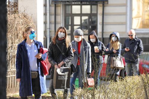 People queue before undergoing medical tests for coronavirus disease (COVID-19) at a laboratory in Moscow, Russia March 26, 2020. Alexander Avilov/Moscow News Agency/Handout via REUTERS  ATTENTION EDITORS - THIS IMAGE HAS BEEN SUPPLIED BY A THIRD PARTY. NO RESALES. NO ARCHIVES. MANDATORY CREDIT.