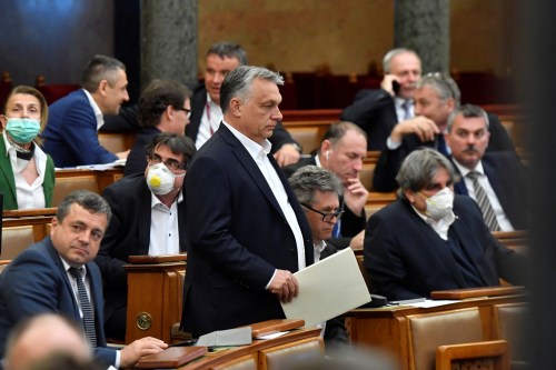 Hungarian Prime Minister Viktor Orban arrives to attend the plenary session of the Parliament ahead of a vote to grant the government special powers to combat the coronavirus disease (COVID-19) crisis in Budapest, Hungary, March 30, 2020. MTI Zoltan Mathe/Pool via REUTERS
