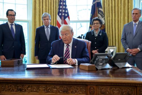 U.S. President Donald Trump caps his pen after signing the Paycheck Protection Program and Health Care Enhancement Act financial response to the coronavirus disease (COVID-19) outbreak, in the Oval Office at the White House in Washington, U.S. April 24, 2020.  REUTERS/Jonathan Ernst