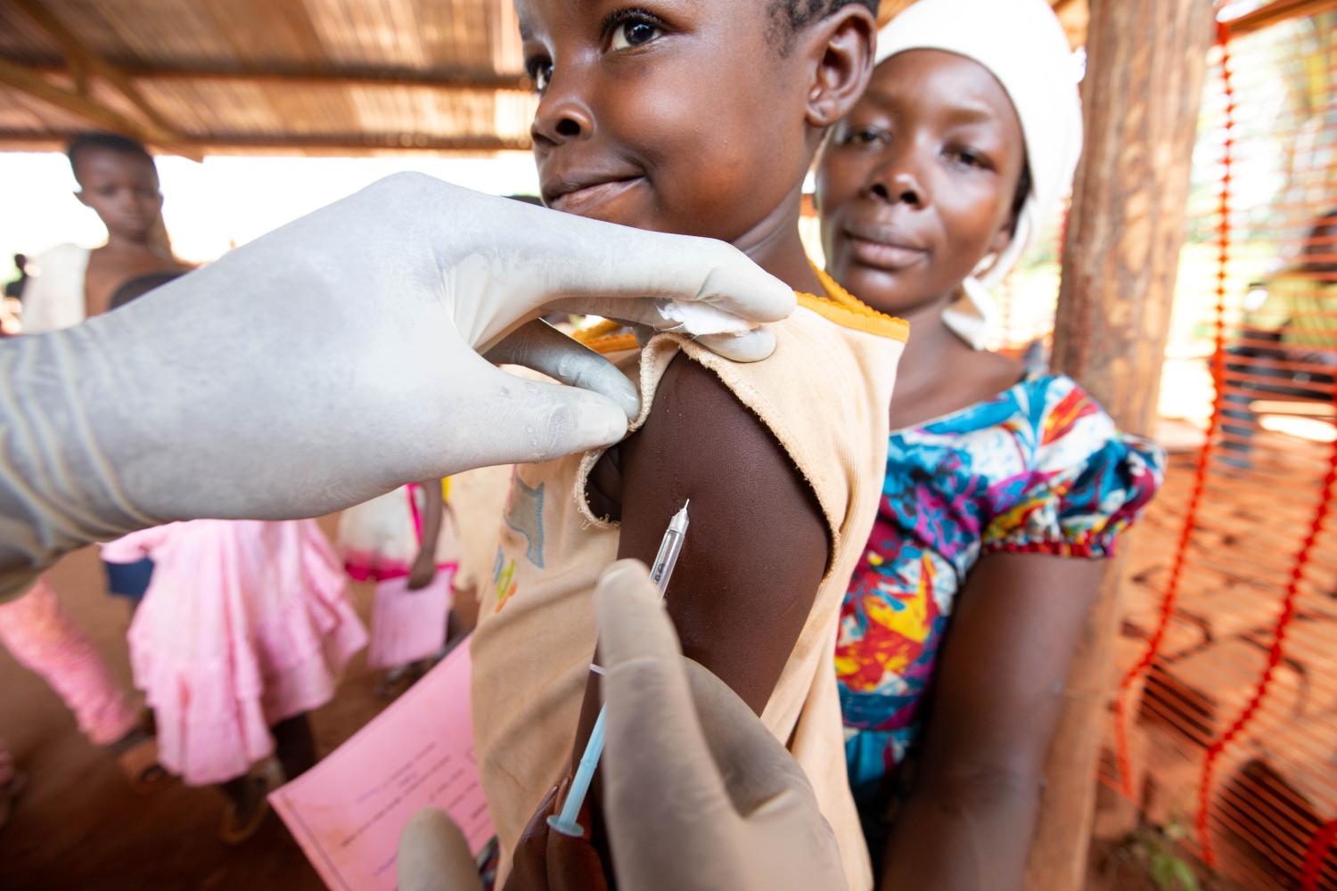 A child is given a measles vaccination during an emergency campaign run by Doctors Without Borders (MSF) in Likasa, Mongala province in northern Democratic Republic of Congo March 3, 2020. Picture taken March 3, 2020. REUTERS/Hereward Holland
