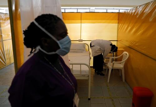 Medical staff members work at the yet to be used field hospital build to treat a large number of patients due to the spread of the coronavirus disease (COVID-19), at the Aga Khan University Hospital in Nairobi, Kenya, April 9, 2020. REUTERS/Baz Ratner