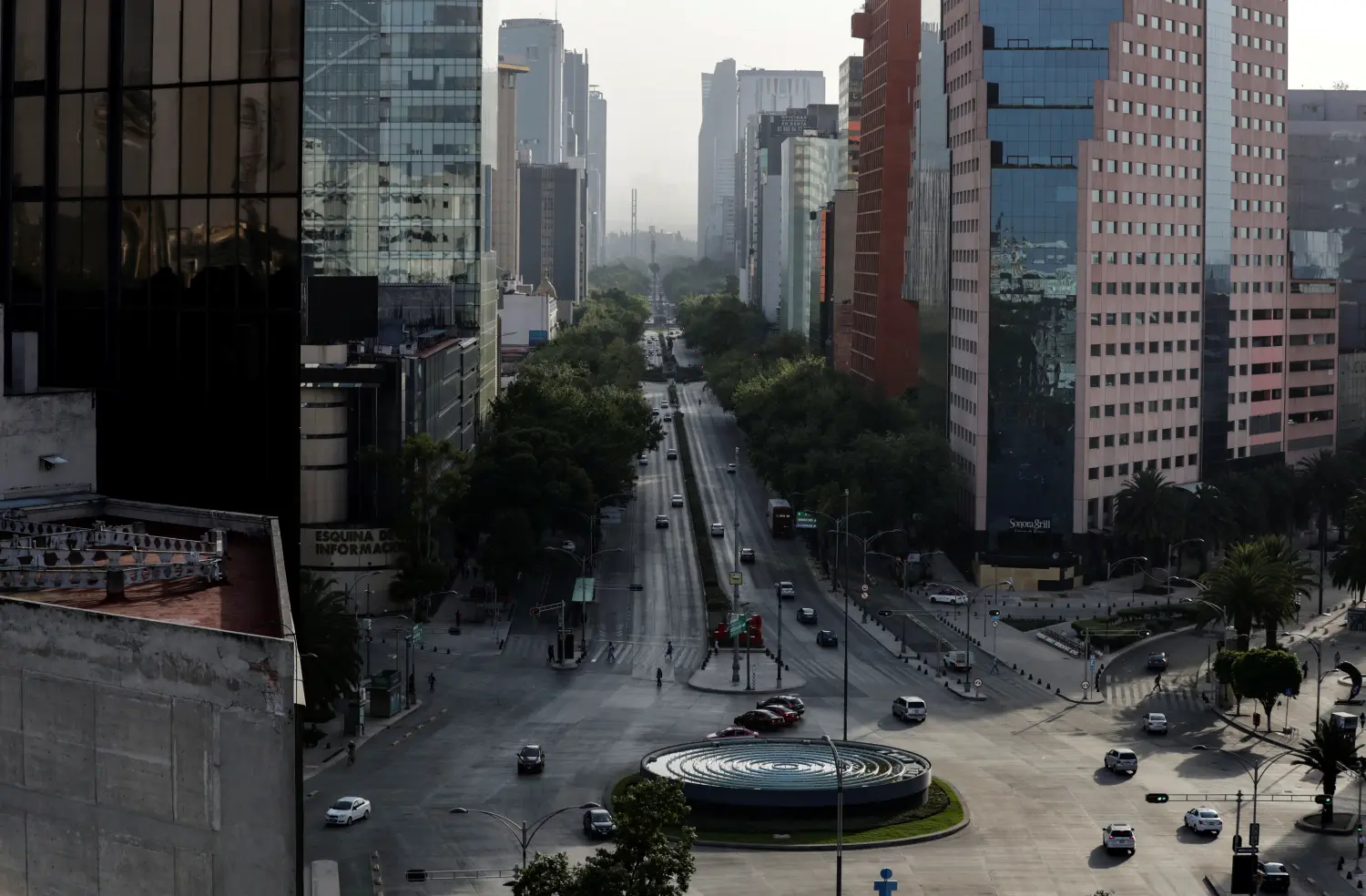 A general view shows the partially empty Reforma Avenue after Mexico's government declared a health emergency on Monday and issued stricter rules aimed at containing the fast-spreading coronavirus disease (COVID-19), in Mexico City, Mexico March 31, 2020. REUTERS/Henry Romero