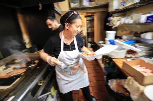 Libby Hantzandreou, owner of Libby's Restaurant on 8th and Tatnall St., cooks up breakfast for her customers in the kitchen.Wil Libby Retires
