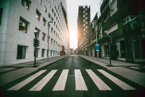 Empty Urban Street with Skyscraper at Sunrise