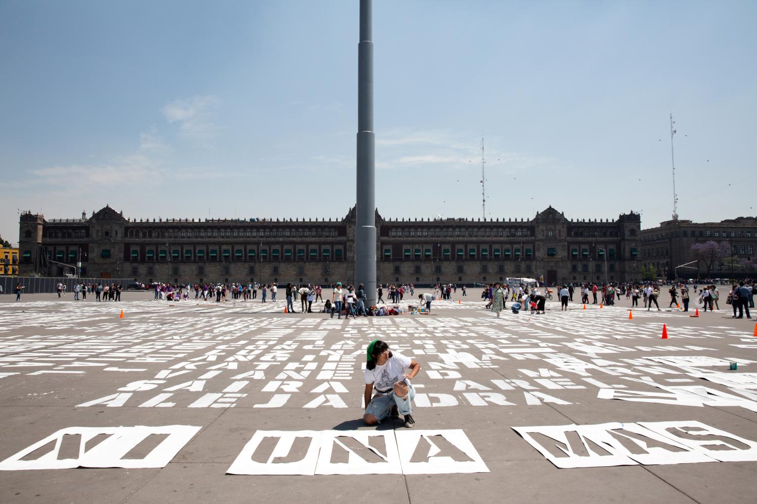 Women are painting the names of victims of femicide in front of Mexicos National Palace before a massive march to protest gender-based violence and inequality on International Womens Day at Zocalo Square in Mexico City, Mexico on March 8, 2020. According to government statistics, at least ten women are murdered every day in Mexico, making it one of the most dangerous countries in the world for girls and women. Femicides rates have doubled in the past five years in Mexico. Impunity is a major problem, 90 percent of cases go unsolved. After a series of brutal femicides, activists called for a national womens strike. On March 9, thousands of women and girls across Mexico are expected to stay home from works, schools and social media sites, in a mass strike called "A Day Without Us" to protest a rising wave of violence against women and what many call an unresponsive government. (Photo by Bénédicte Desrus/Sipa USA)No Use UK. No Use Germany.