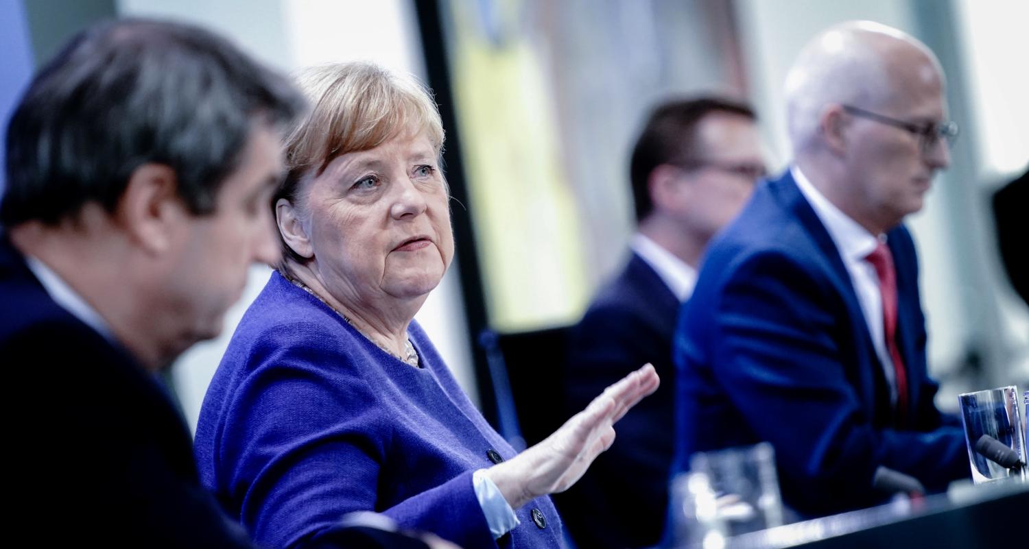 German Chancellor Angela Merkel, Bavarian Prime Minister Markus Soeder and Hamburg mayor Peter Tschentscher attend a news conference after discussing with German state premiers whether the regulations imposed to limit the spread of the coronavirus disease (COVID-19) need relaxing, at the Chancellery in Berlin, Germany, April 30, 2020. Kay Nietfeld/Pool via REUTERS