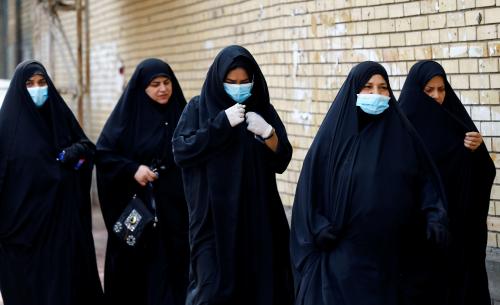 Shi'ite pilgrims make their way to Kadhimiya to mark the death of Imam Moussa al-Kadhim during a curfew imposed to prevent the spread of coronavirus disease (COVID-19), in Baghdad, Iraq March 18, 2020. REUTERS/Thaier Al-Sudani