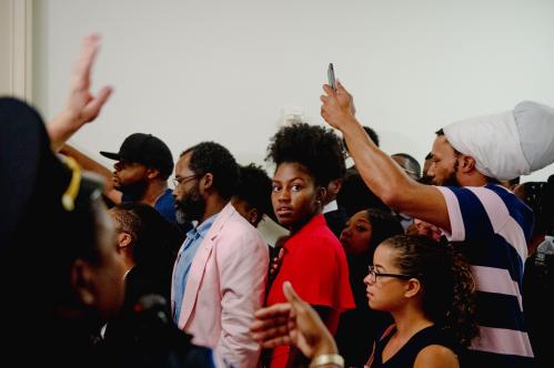People wait in line to enter a hearing on reparations for slavery in Washington. Xxx 20190619 Yk Reparations Hear 131 Jpg Usa Dc