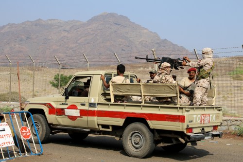 FILE PHOTO: Southern Yemeni separatist security members patrol a street during a campaign to seize unlicensed motorcycles in Aden, Yemen December 10, 2019. REUTERS/Fawaz Salman/File Photo