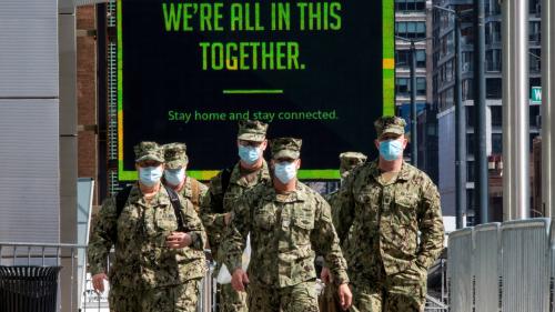 U.S. military personnel wearing face masks arrive at the Jacob K. Javits Convention Center, as the outbreak of the coronavirus disease (COVID-19) continues, in the Manhattan borough of New York City, New York, U.S., April 7, 2020. REUTERS/Eduardo Munoz     TPX IMAGES OF THE DAY