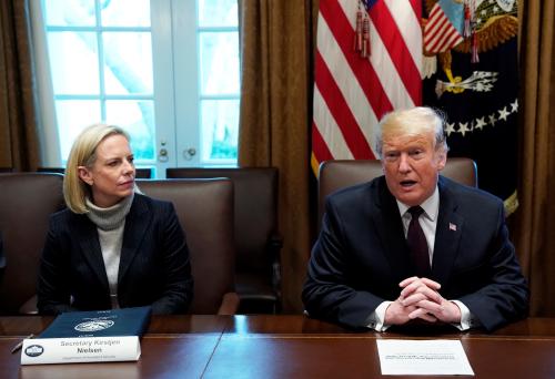 Department of Homeland Security (DHS) Secretary Kirstjen Nielsen listens as U.S. President Donald Trump leads a discussion on immigration proposals with conservative leaders in the Cabinet Room of the White House in Washington, U.S., January 23, 2019. REUTERS/Kevin Lamarque