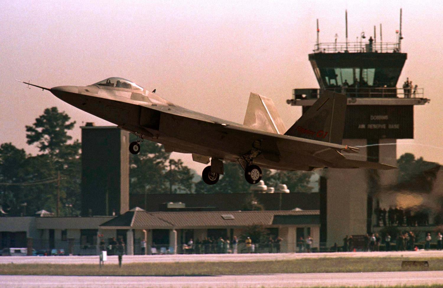 The F-22 Raptor takes off for its maiden flight at the Lockheed Martin facility at Dobbins Air Force Base in Marietta, Georgia September 7.  The $100 million dollar stealth fighter/bomber, built by the team of Lockheed Martin, Boeing and Pratt & Whittney, will run 8,690 tests during its first flight.