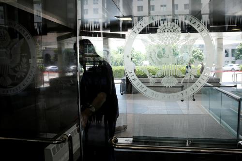 An employee enters the State Department in Washington, U.S., June 2, 2017. REUTERS/Yuri Gripas