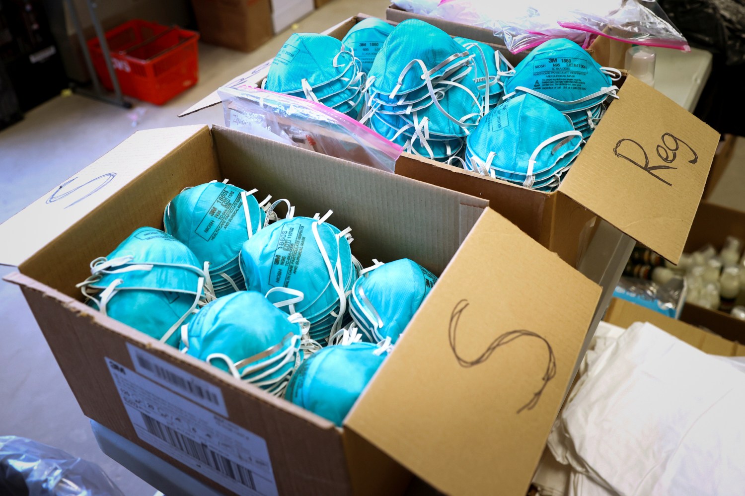 FILE PHOTO: Boxes of N95 protective masks for use by medical field personnel are seen at a New York State emergency operations incident command center during the coronavirus outbreak in New Rochelle, New York, U.S., March 17, 2020. REUTERS/Mike Segar/File Photo