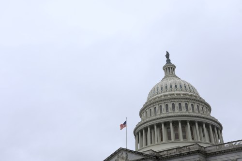 FILE PHOTO: The U.S. Capitol during a morning rainstorm on Capitol Hill in Washington, U.S., March 25, 2020. REUTERS/Tom Brenner/File Photo