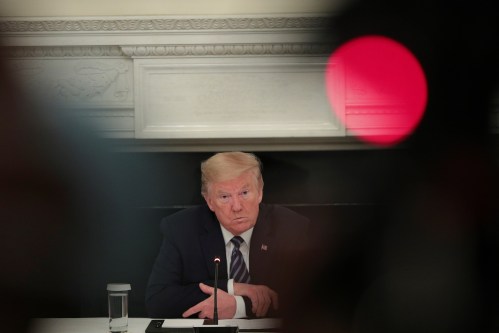 U.S. President Donald Trump LISTENS during a meeting with Republican members of Congress in the State Dining Room at the White House in Washington, U.S., May 8, 2020. REUTERS/Tom Brenner