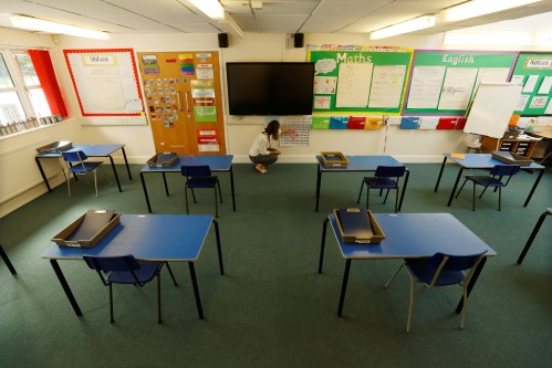 Tables are seen in a classroom as teacher Rhiannon Sharman makes preparations for Watlington Primary School to reopen to children on June 1, following the outbreak of the coronavirus disease (COVID-19), Watlington, Britain, May 21, 2020. REUTERS/Eddie Keogh