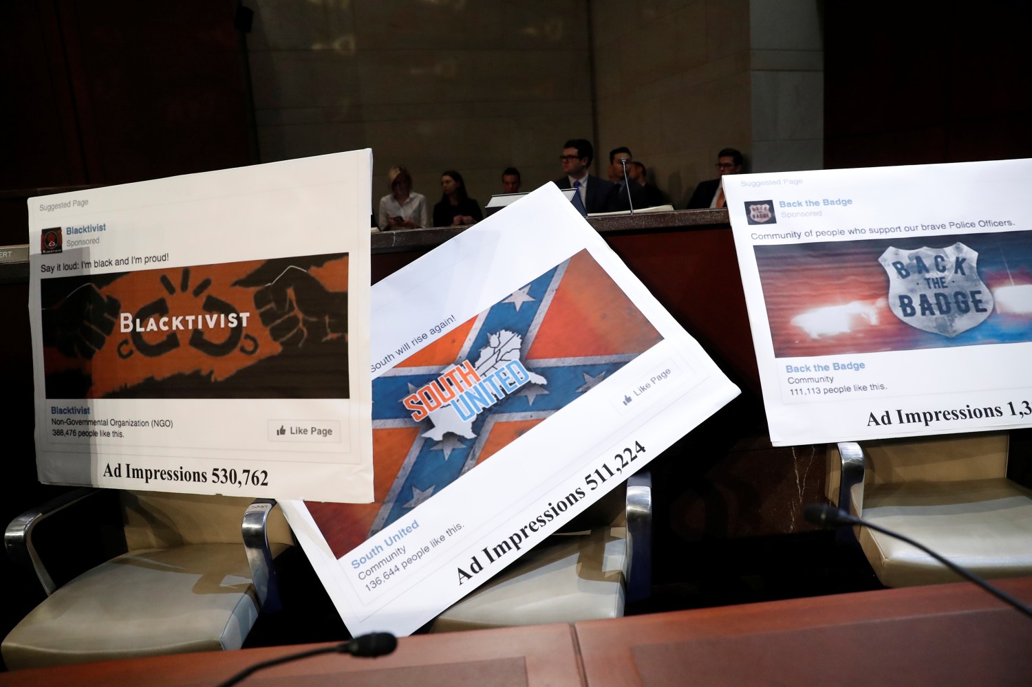 Examples of Facebook pages are seen, as executives appear before the House Intelligence Committee to answer questions related to Russian use of social media to influence U.S. elections, on Capitol Hill in Washington, U.S., November 1, 2017. REUTERS/Aaron P. Bernstein