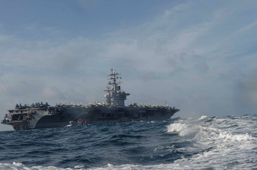 Personnel assigned to the U.S. Navy aircraft carrier USS Dwight D. Eisenhower conduct small boat operations during a training exercise in the Arabian Sea April 17, 2020. Picture taken April 17, 2020. U.S. Navy/Mass Communication Specialist Seaman Brennen Easter/Handout via REUTERS THIS IMAGE HAS BEEN SUPPLIED BY A THIRD PARTY.
