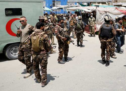 Afghan security forces stand guard outside a hospital which came under attack in Kabul, Afghanistan May 12, 2020. REUTERS/Mohammad Ismail