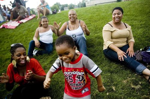 Zacariah Randall, 4, dances to the music near one of the entertainment stages at the Clarissa Street Reunion at Corn Hill on Saturday afternoon in Rochester. The celebration that stretched down the neighborhood that was an early center of Rochester's African-American culture had three different stages of entertainment, food and vendors and went into the evening. (08/15/2009 - staff photo by Andrea Morales - Democrat and Chronicle)Clarissa Street Reunion