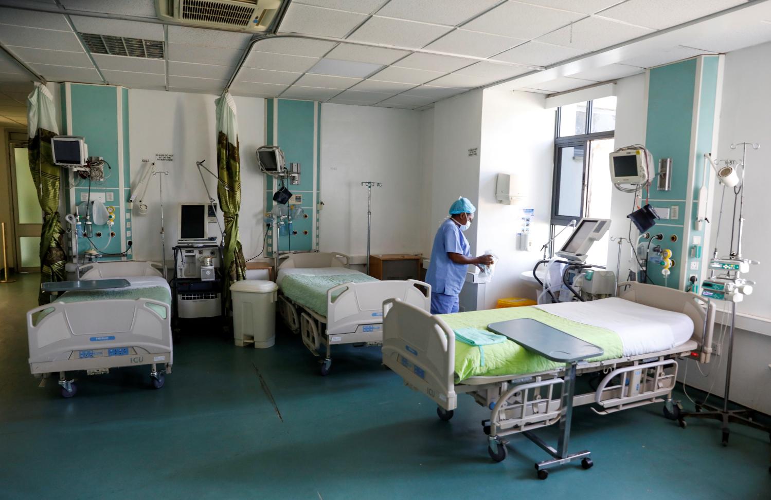 A nurse demonstrates how to activate a respirator as the hospital prepares for the coronavirus disease (COVID-19) outbreak, at the Karen hospital near Nairobi, Kenya, April 6, 2020. Picture taken April 6, 2020. REUTERS/Baz Ratner