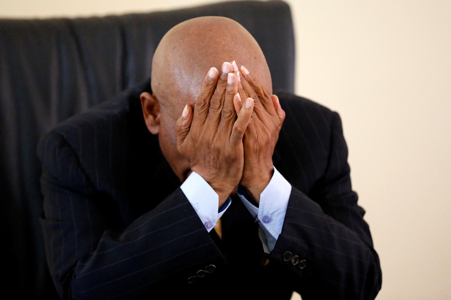 FILE PHOTO: Lesotho's Prime Minister Thomas Thabane reacts as he speaks to Reuters at the state house in the capital Maseru, Lesotho February 27, 2015. REUTERS/Siphiwe Sibeko/File Photo