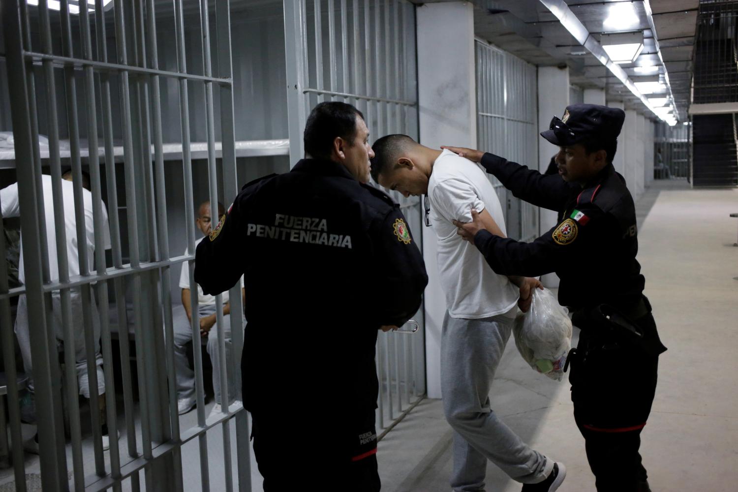 Inmates of the Topo Chico prison, which will be closed soon to be used as a public park, are pictured inside of a new prison in the municipality of Apodaca, Mexico September 28, 2019. REUTERS/Daniel Becerril